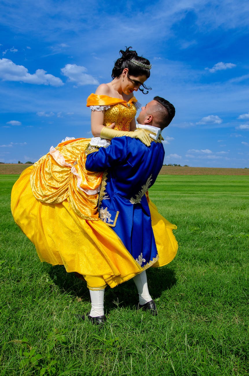 man and woman dressed up as beauty and the beast