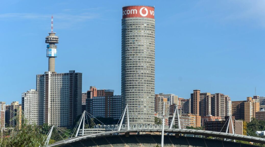 city buildings with view of the ponte city apartments in johannesburg south africa