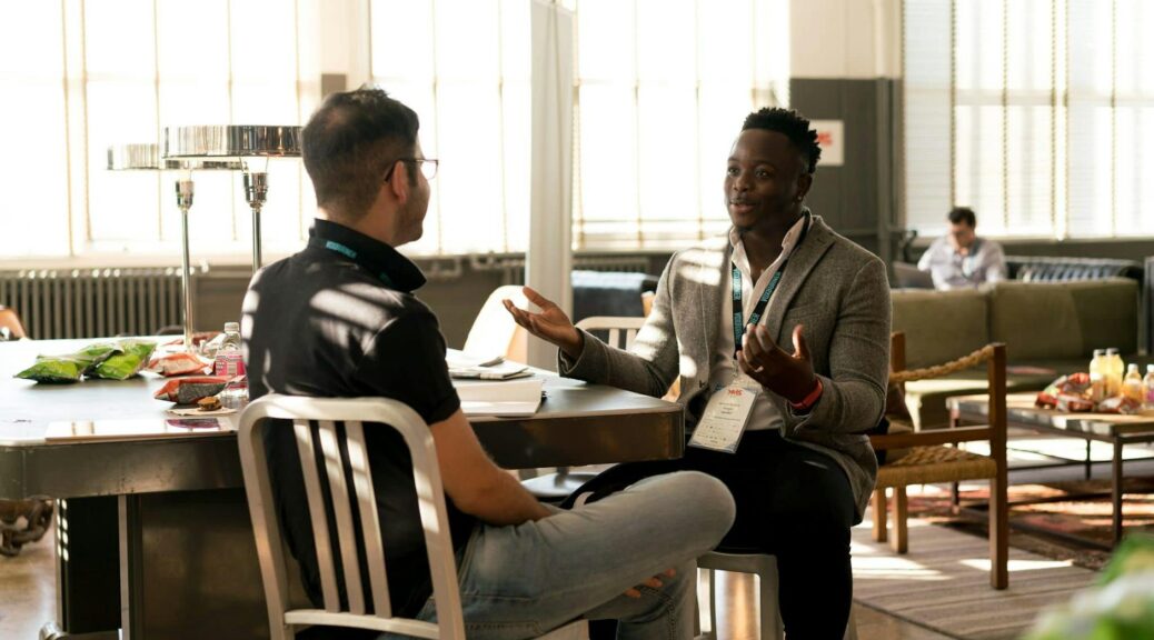 photo of men having conversation